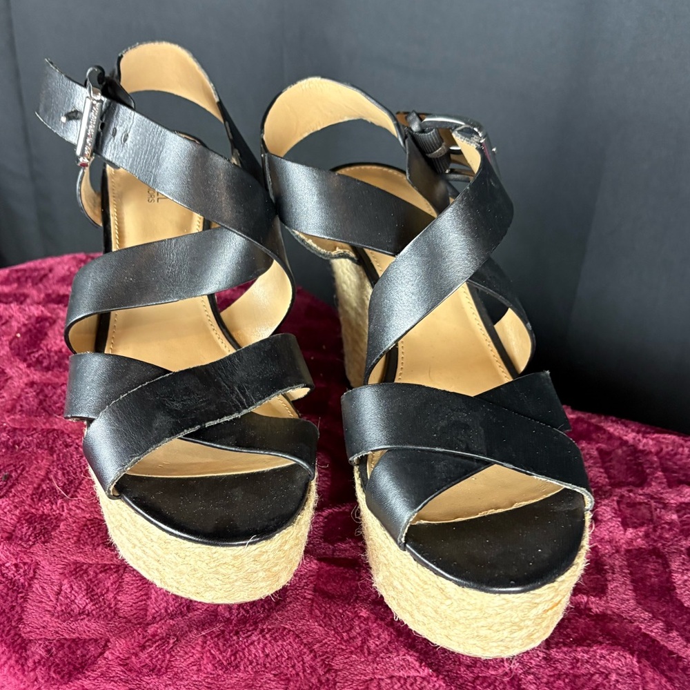 Michael Kors wedge sandals in black sand.